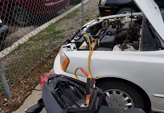 Connecting-the-Jumper-Cable-to-the-Car’s-Battery Connecting the Jumper Cable to the Car’s Battery